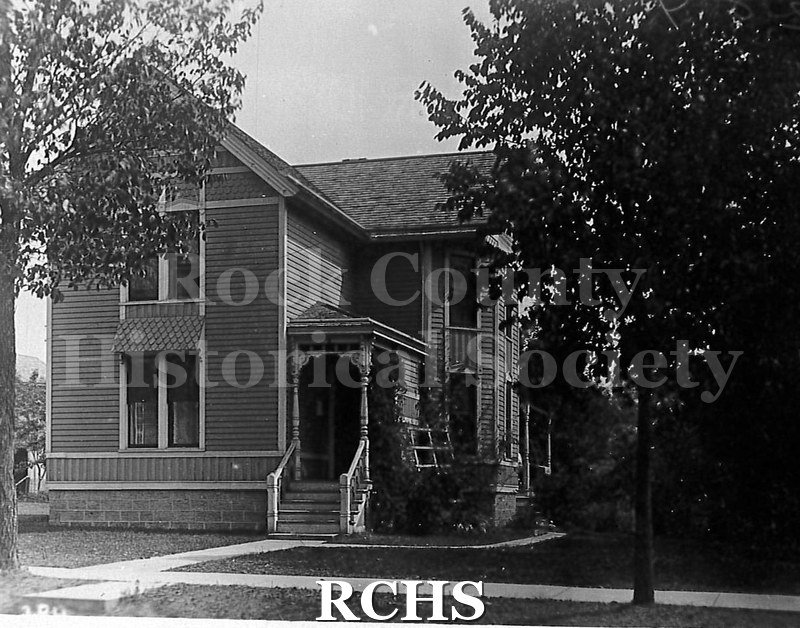 Postcard. Black and white photograph of Dr. Azra Lovelle Burdick's home at 426 Fifth Avenue in Janesville.