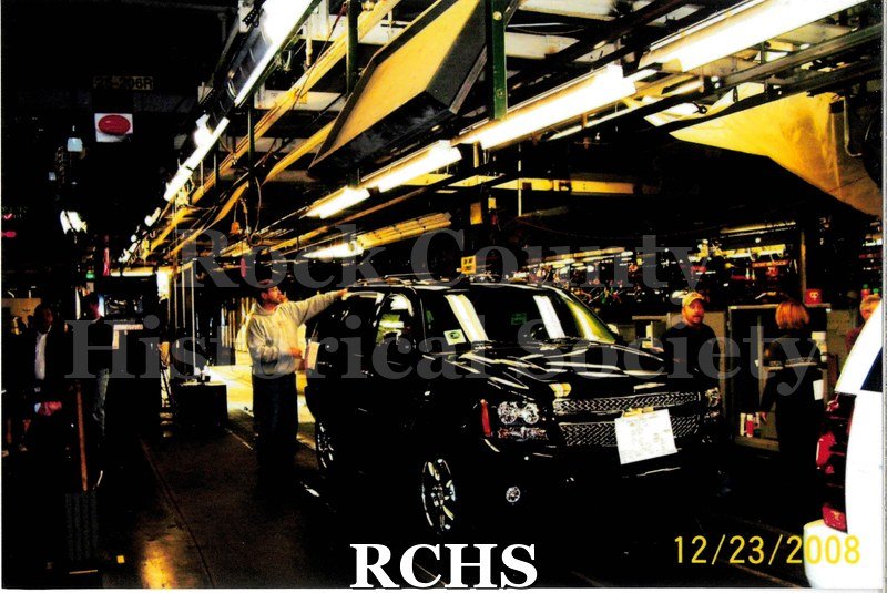 Digital color photo of the last car made at Janesville General Motors. The car is complete or almost complete.