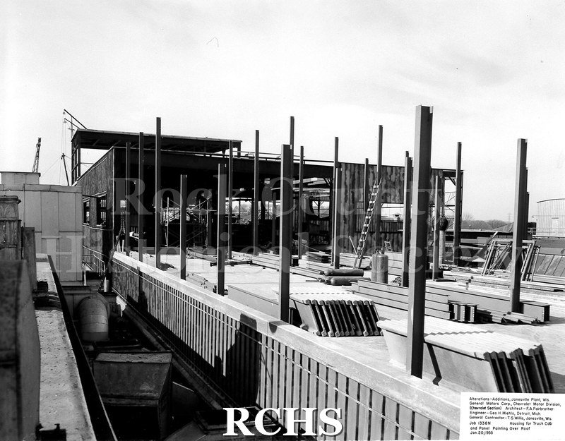 Black and white photograph of the top section under construction. Shows single steel posts. On bottom: "Alterations-Additions, Janesville Plant, Wis.