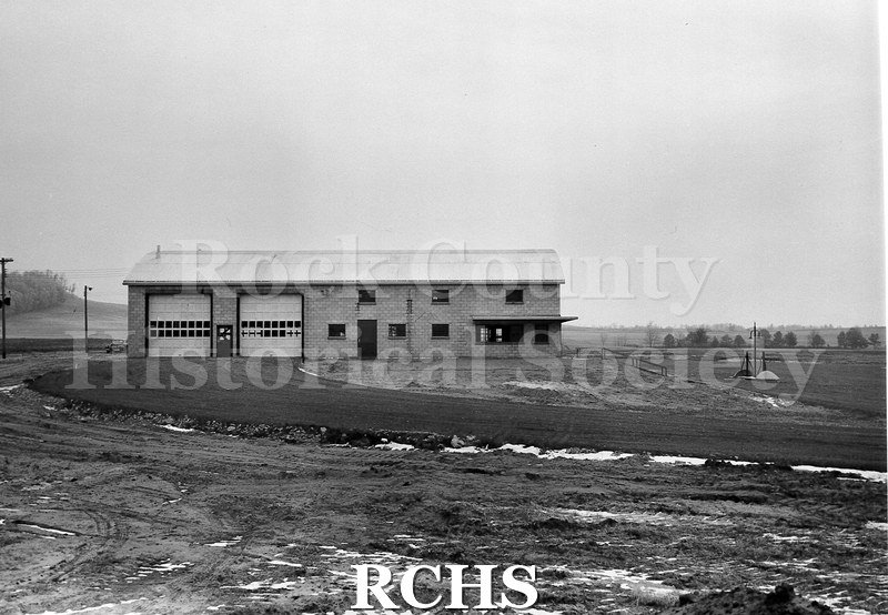 Black and white photograph of the completed W.R. Arthur building in Black River Falls in January 1954.