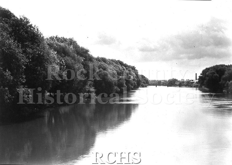 Black and white photograph looking toward Racine St. Bridge from Court Street.