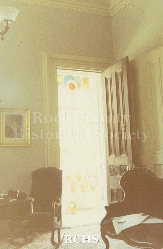 Colored photograph of the first floor of the Tallman House.