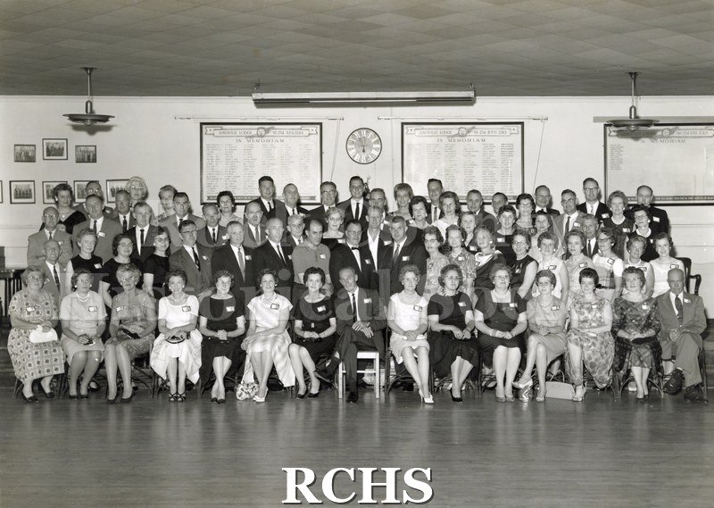 Black and white photograph of the Janesville High School Class of 1932 at their 30th Reunion in 1962.