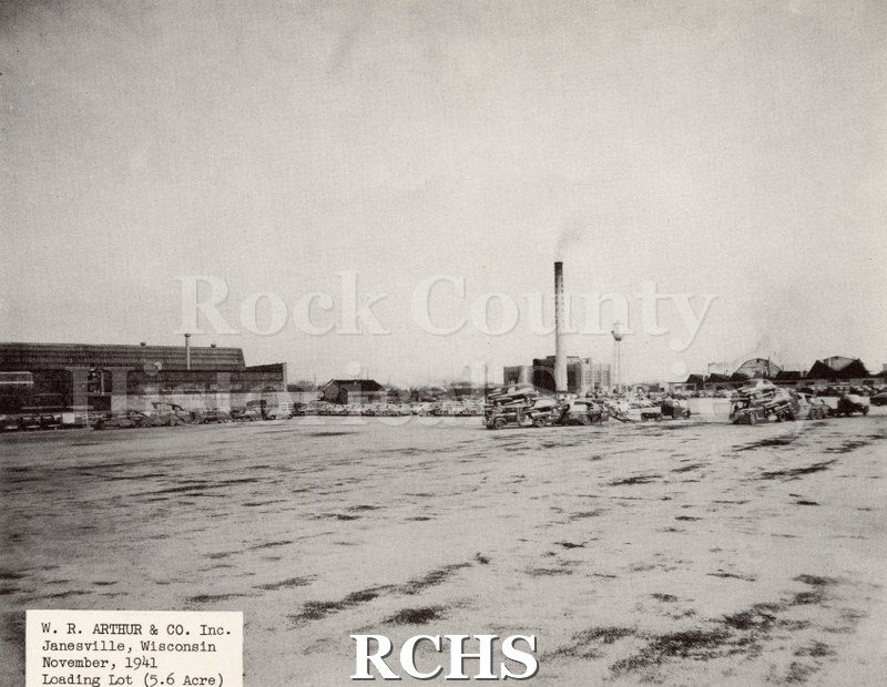 Black and white photograph of W. R. Arthur and Company Inc. loading lot building.