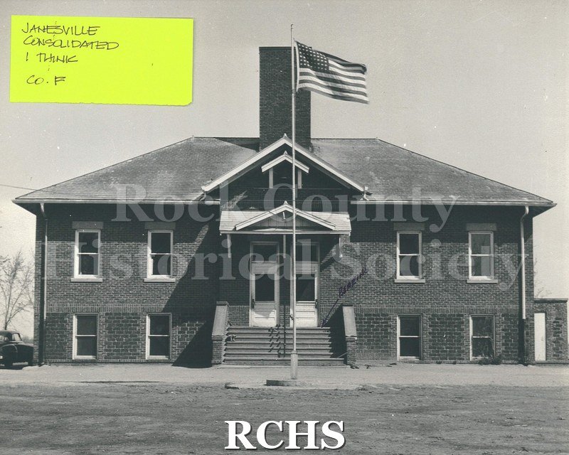 Black and white photograph of front of what is possibly the Janesville Consolidated School.
