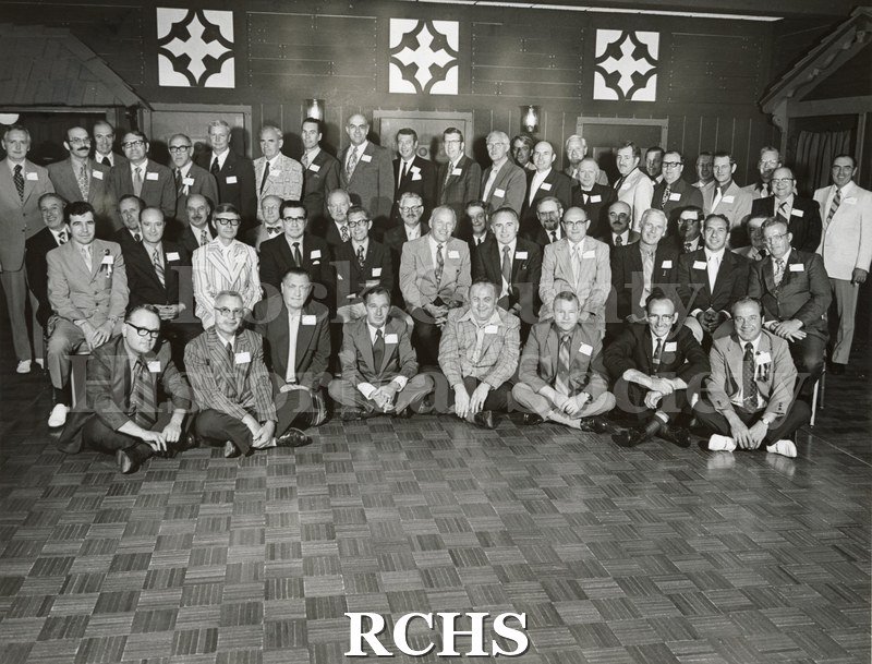 Black and white photograph of the Janesville High School Class of 1942's 30th class reunion, which was held on 15 July 1972 at the Ramada Inn in Janesville.