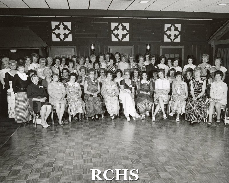 Black and white photograph of the Janesville High School Class of 1942's 30th class reunion, which was held on 15 July 1972 at the Ramada Inn in Janesville.