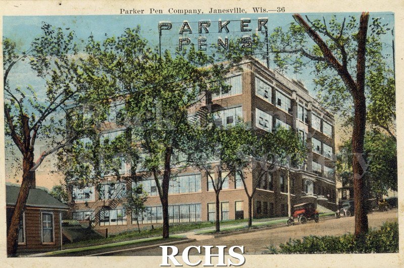 Postcard. Tinted image of the exterior of Parker Pen on Court Street.
