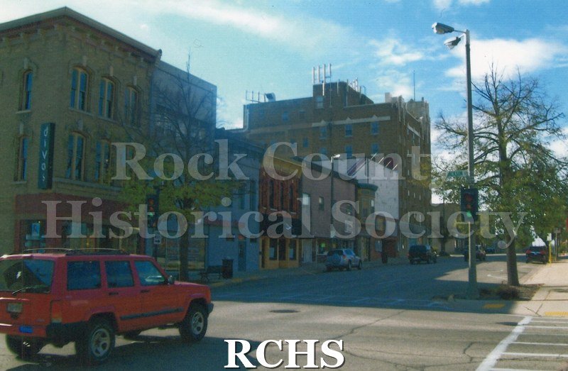 Color photo of the Monterey Hotel looking west from Jackson Street up W. Milwaukee Street (300 block).
