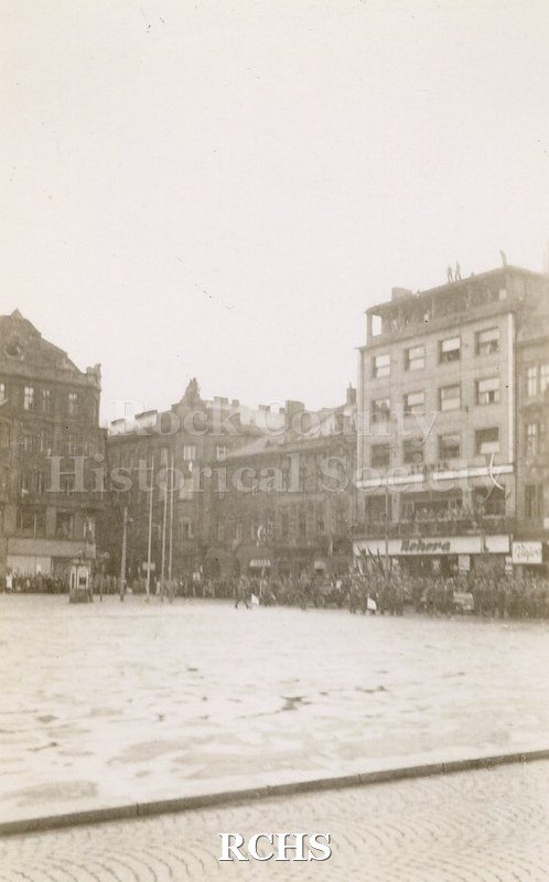 Black and white photograph of U.S. troops moving in to an unknown location in Germany.