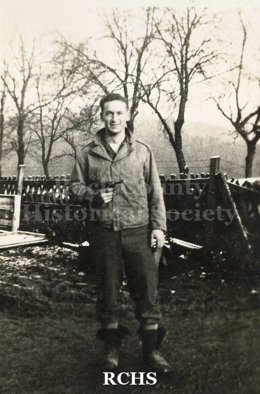 Black and white photograph of an unidentified soldier. Photo was taken by Harvey Thompson (1920 - 1978), who lived at 213 Water Street in Janesville.