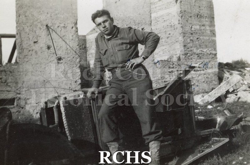 Black and white photograph of an unidentified soldier. Photo was taken by Harvey Thompson (1920 - 1978), who lived at 213 Water Street in Janesville.