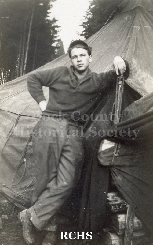 Black and white photograph of an unidentified soldier. Photo was taken by Harvey Thompson (1920 - 1978), who lived at 213 Water Street in Janesville.