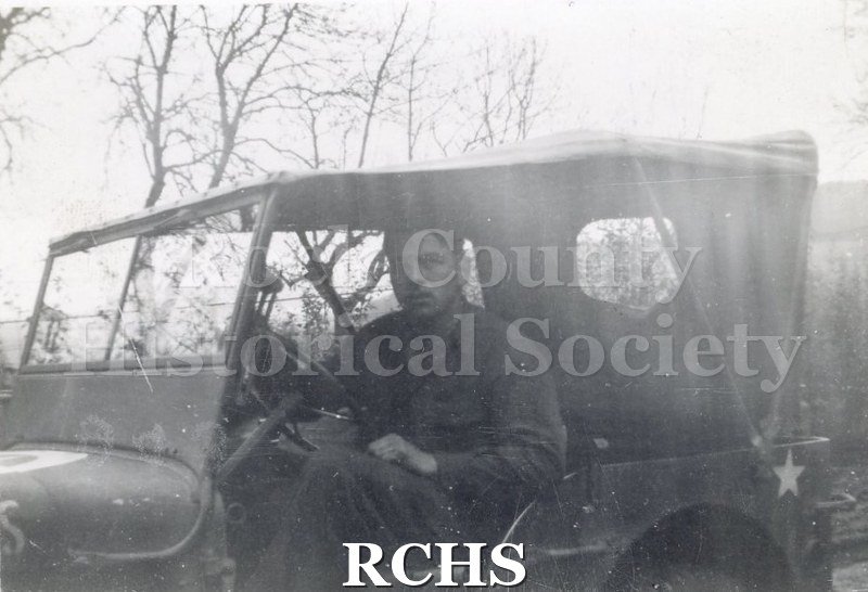 Black and white photograph of an unidentified soldier. Photo was taken by Harvey Thompson (1920 - 1978), who lived at 213 Water Street in Janesville.