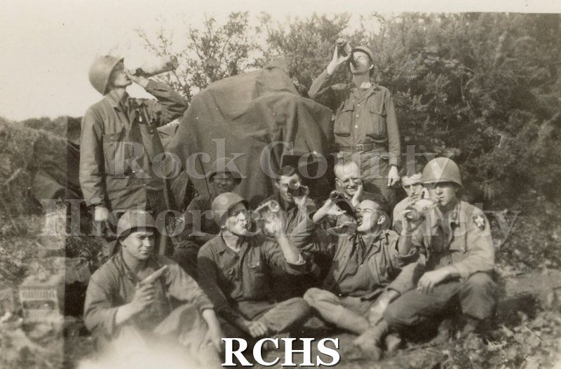 Black and white photograph of a group of U.S. soldiers. Photo was taken by Harvey Thompson (1920 - 1978), who lived at 213 Water Street in Janesville.