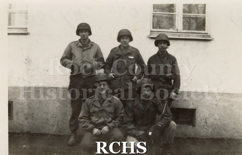 Black and white photograph of a group of US soldiers. Photo was taken by Harvey Thompson (1920 - 1978), who lived at 213 Water Street in Janesville.