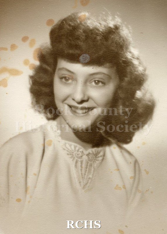 Black and white photograph of Delores Dittmer on the occasion of her graduation from Milton High School.