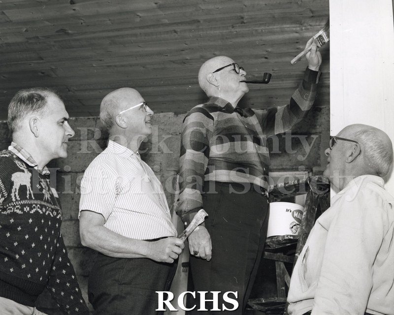 Black and white photograph of volunteers preparing the RCHS Stone House for public exhibition in April 1967. From left to right: A.W. Dunwiddie, Jr.