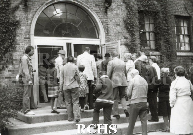 Historic image of Black and white snapshot of an event at the RCHS when the historical society was still housed in the Armory building downtown.
