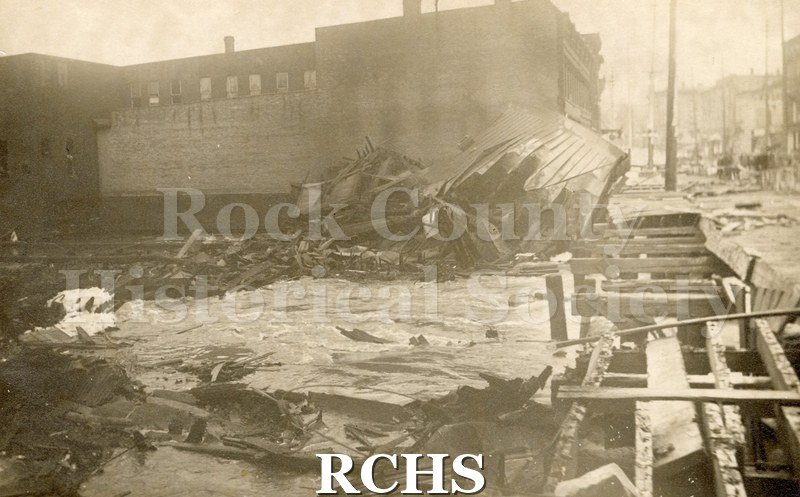 Postcard. Black and white photograph of 4/1/1913 Milwaukee St. Bridge Fire.