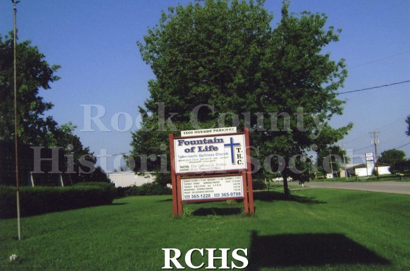 Colored photograph of Fountain of Life Tabernacle Holiness Church, 1600 Huebbe Pkwy., Beloit. Photo of the sign outside.