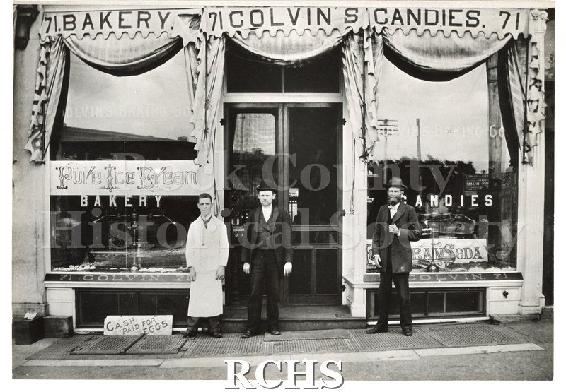 Black and white photograph of Colvin's Bakery and Candies storefront.