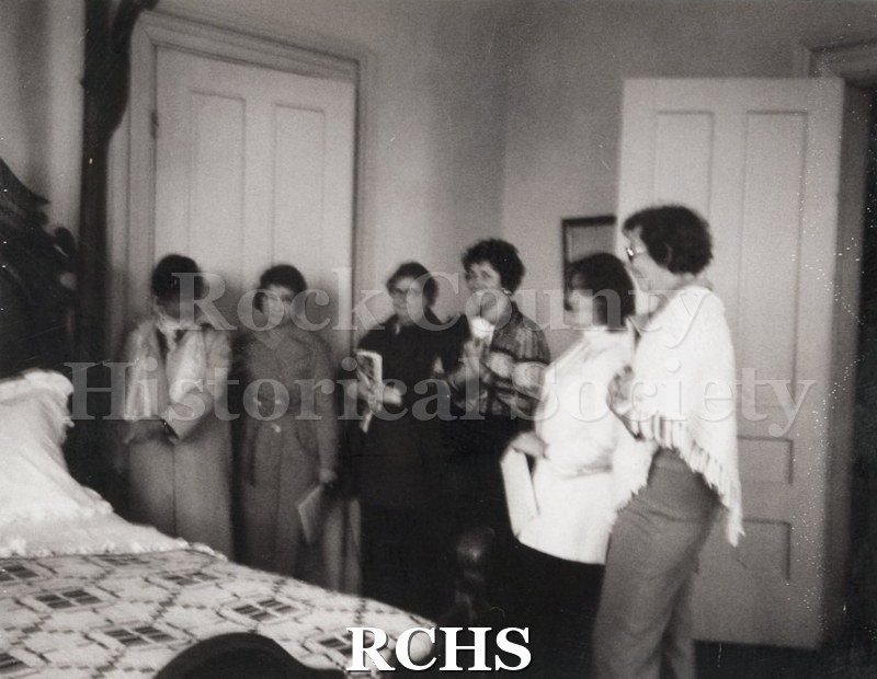 Black and white photograph of RCHS docent training in the Lincoln-Tallman House, spring 1978.