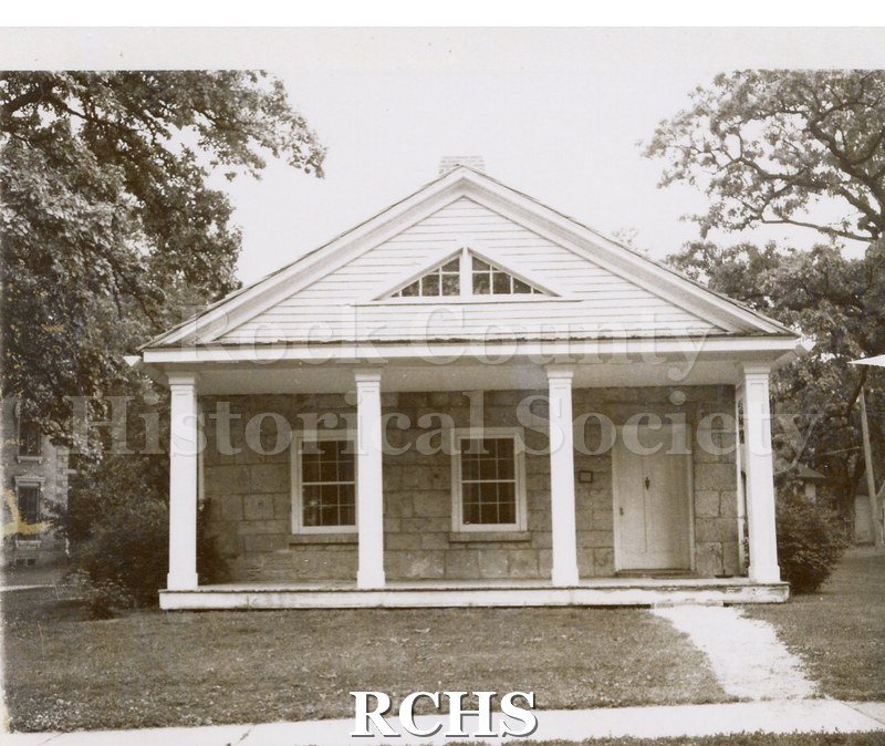 Black and white photograph of the Stone House on the Tallman campus.