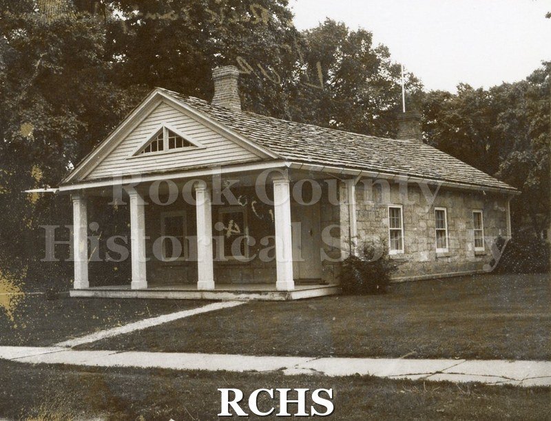 Black and white photograph of the Stone House on the Tallman campus.