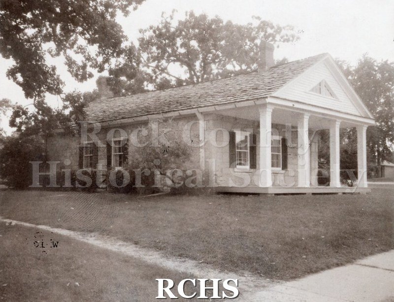 Black and white photograph of the Stone House on the Tallman campus.
