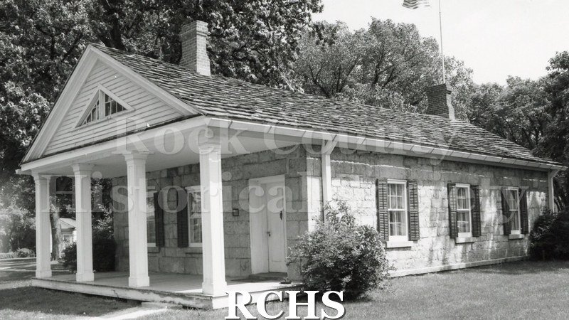 Black and white photograph of the Stone House on the Tallman campus.