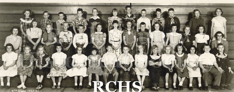 Black and white photograph of Edgerton 4th Grade class, 1950 -1951. Shows boys and girls and teachers on bleachers.