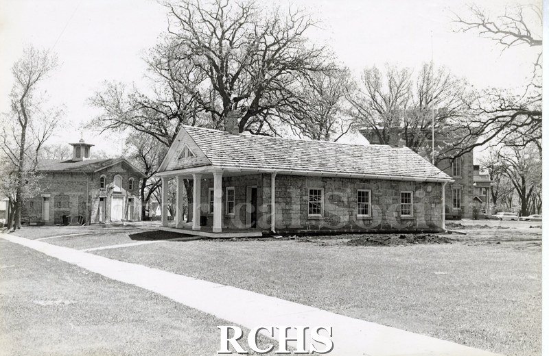 Black and white photograph of the Stone House.