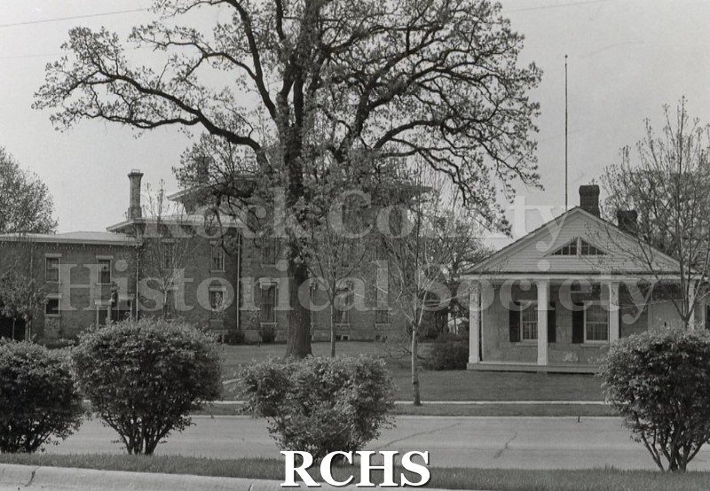 Black and white photograph of the Stone House and Tallman House.