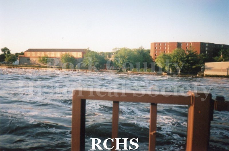 Color photo of Rock River flooding during the June 2008 flood in Janesville.