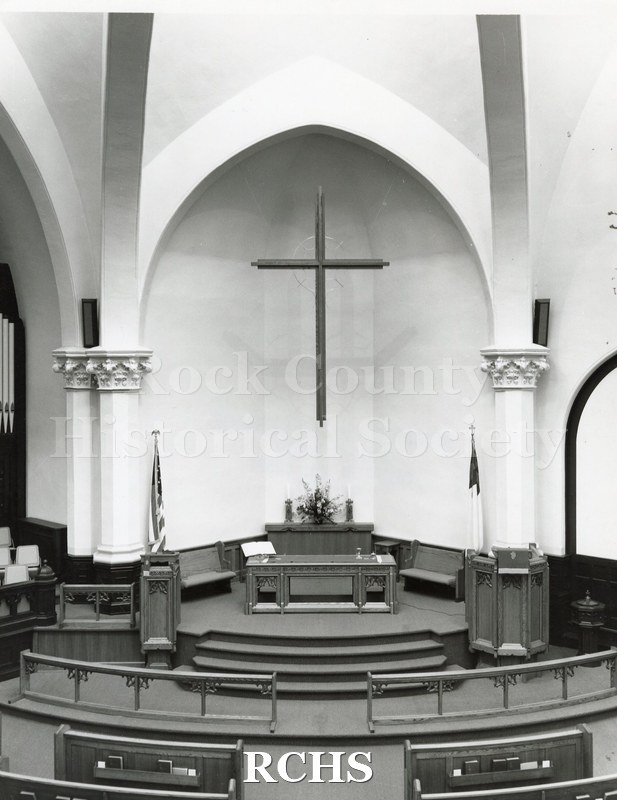 Black and white photograph of the interior of an unidentified church in Decatur, IL, looking toward the altar.