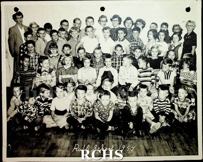Black and white photograph of Ruble School children and teachers taken in 1954.