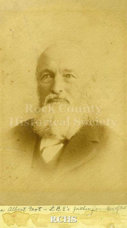 Black and white photograph of Ezra Albert Foot wearing a suit jacket and white shirt. He has a beard and mustache.