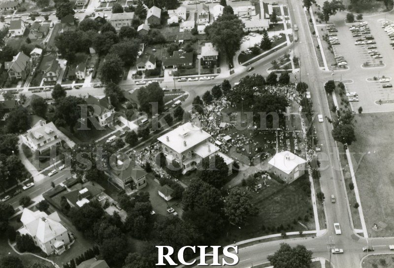 Black and white aerial glossy photograph of the 1983 Tallman Festival. N83014 Strip.