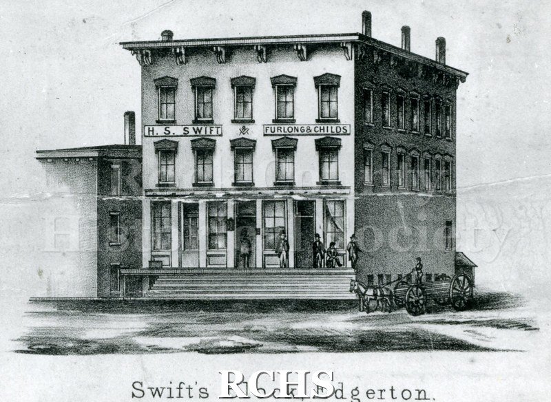Black and white photograph of a drawing of Swift's Block, Edgerton, a three story building with "H. S. Swift" and "Furlong & Childs" showing on the facade.