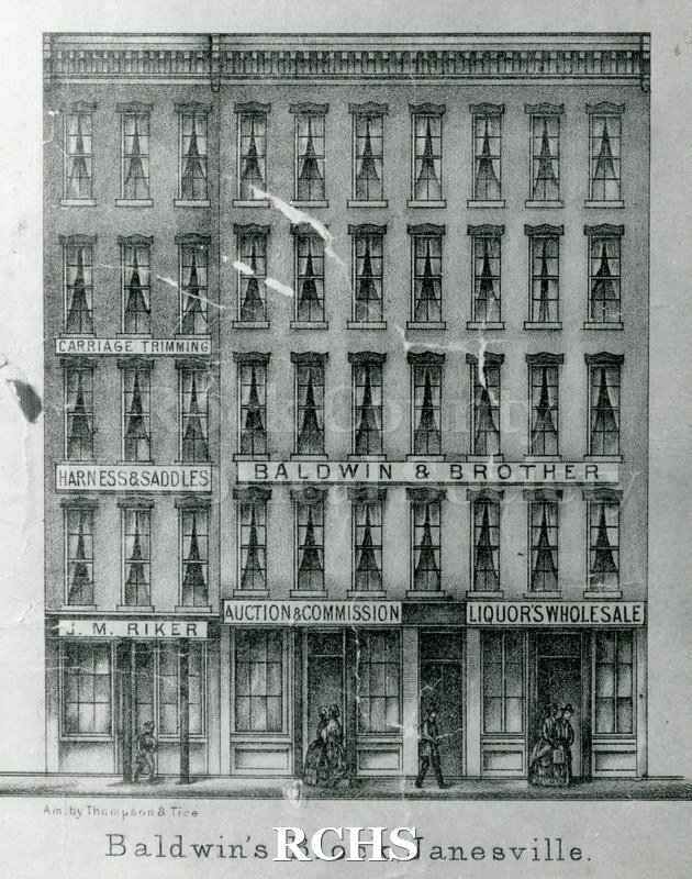Black and white photograph of a drawing of the Baldwin Block, Janesville, WI, a five story building with several stores in it.