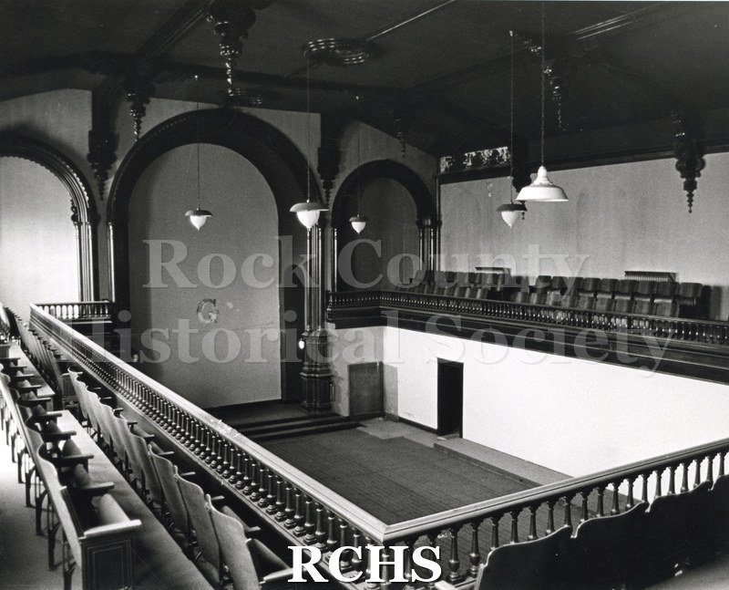 Black and white photograph of the Court Street Methodist Church. Shows the inside of a church showing a balcony with seats on the three sides.