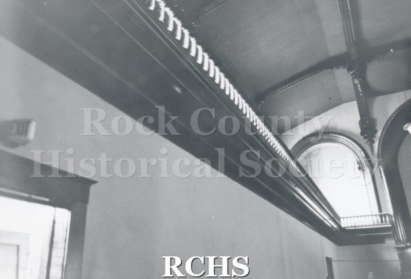 Black and white photograph of the Court Street Methodist Church. Shows the interior of a church, showing the balcony overhead and part of the arched windows.