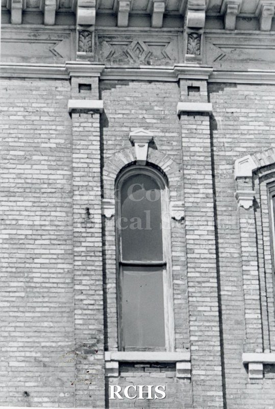 Black and white photograph of Myers Block-Old Armory, Janesville, WI. Shows a brick facade of a building.