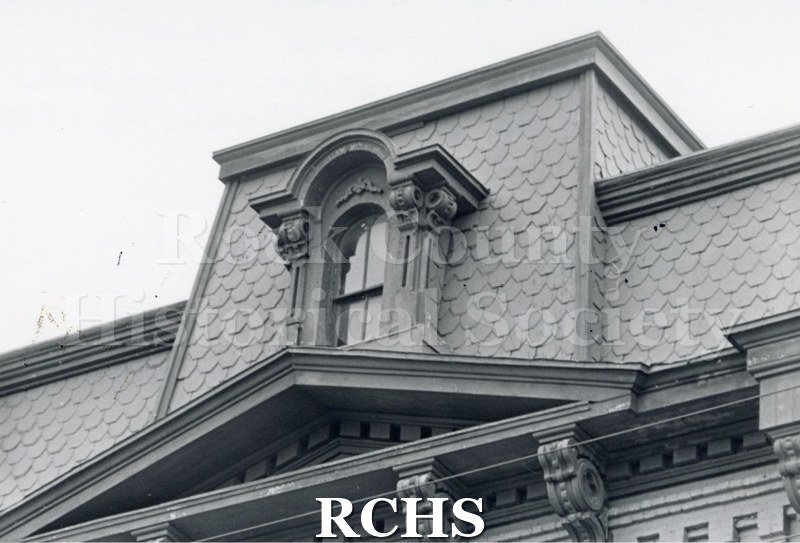 Black and white photograph of the Court Street Methodist Church. Shows a section of the third floor facade.