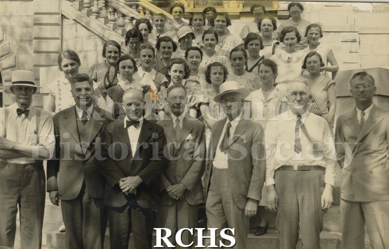 Black and white photograph of officials and employees of the Rock County Court House. Left to right: Front row: Arthur M. Church, county treasurer; Eugene H.