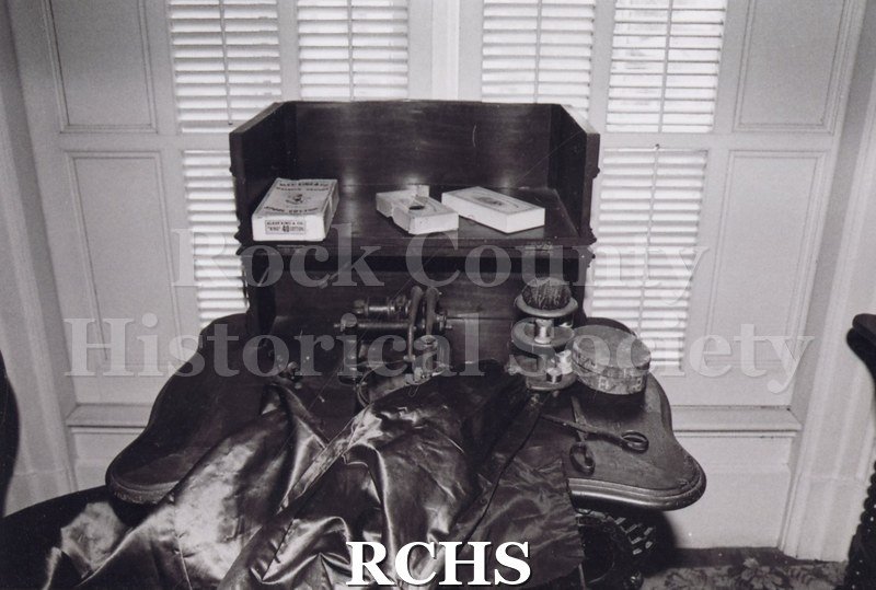 Black and white photograph of the sewing desk on the upper floor of the Tallman House.