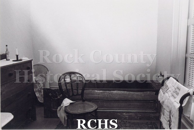Black and white photograph of a Tallman house bathtub.