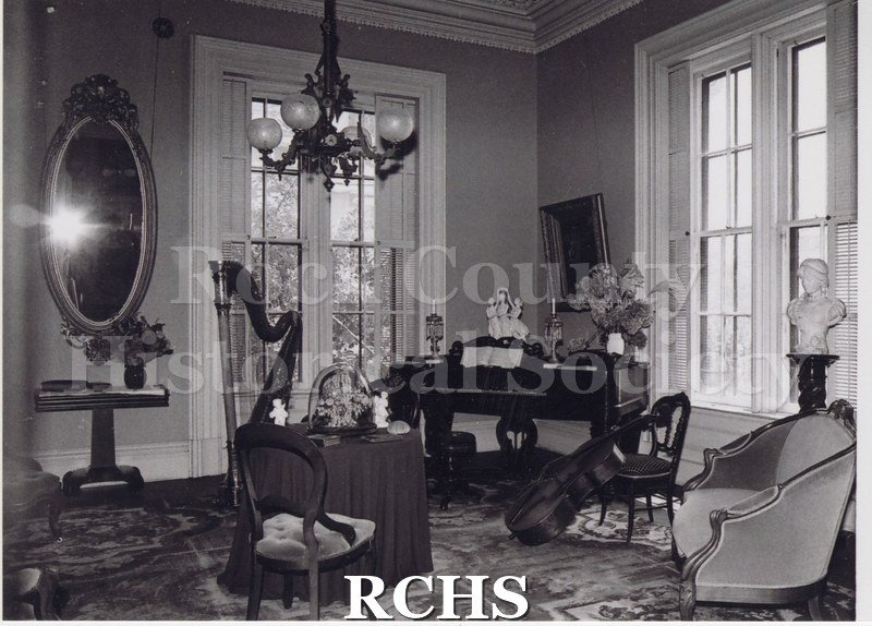 Black and white photograph of the Tallman house parlor.