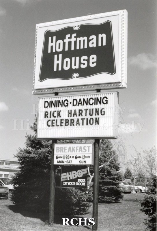 Black and white photograph of the marquee outside of the Hoffman House that reads: "Dining-Dancing Rick Hartung Celebration".